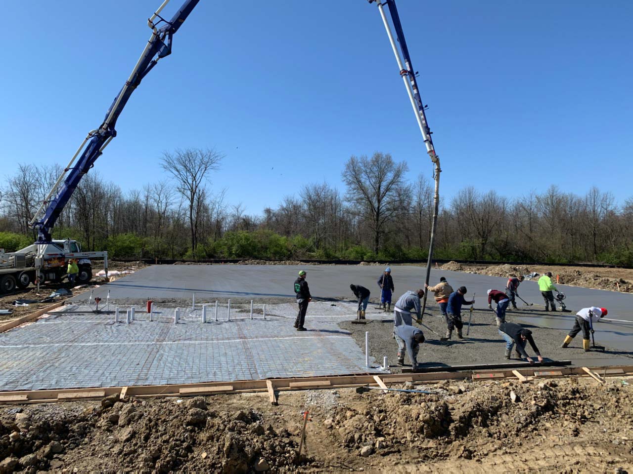 crew installing concrete on commercial project